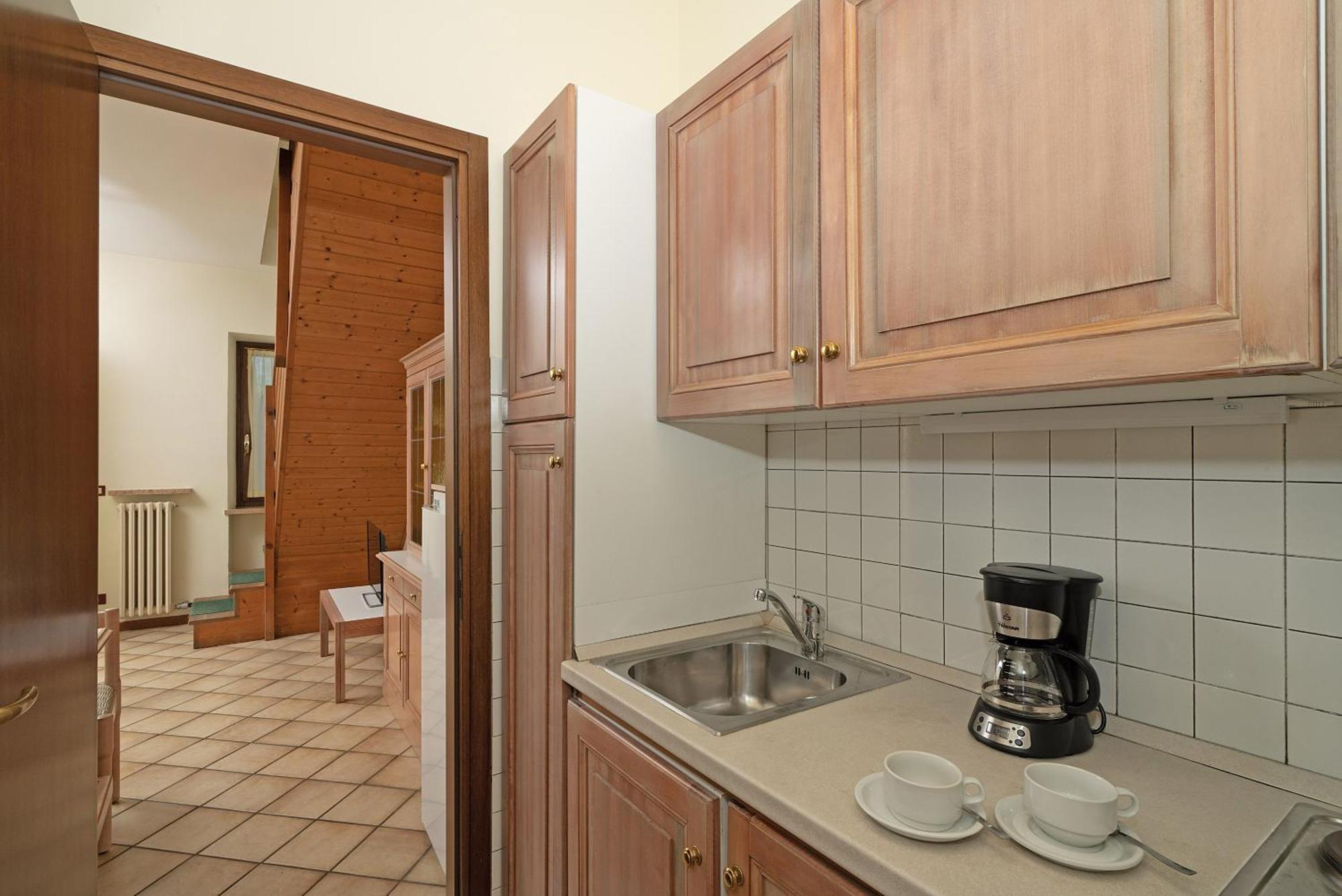 Residence La Filanda Костермано Экстерьер фото